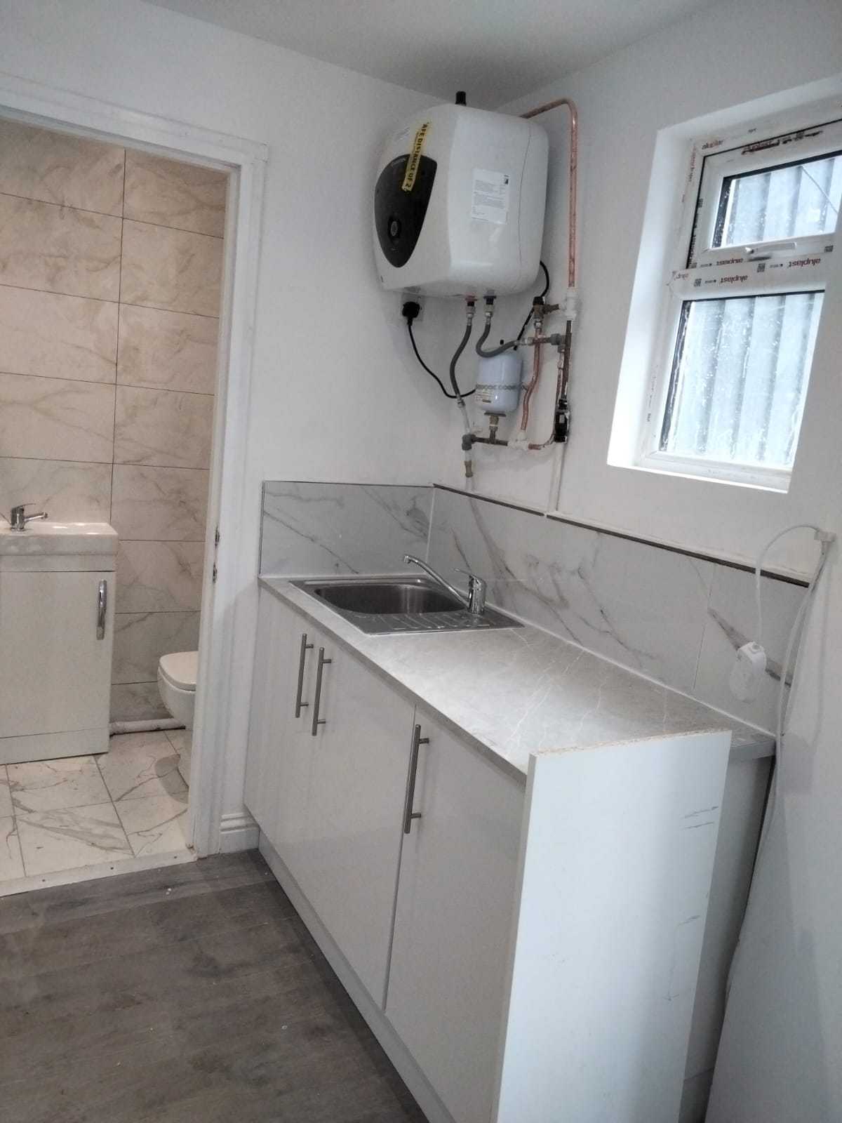 Garden renovation and garage conversion project